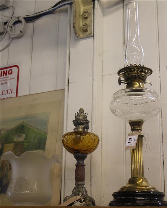 Two 19C oil lamps (one with funnel & shade, one without)(-)